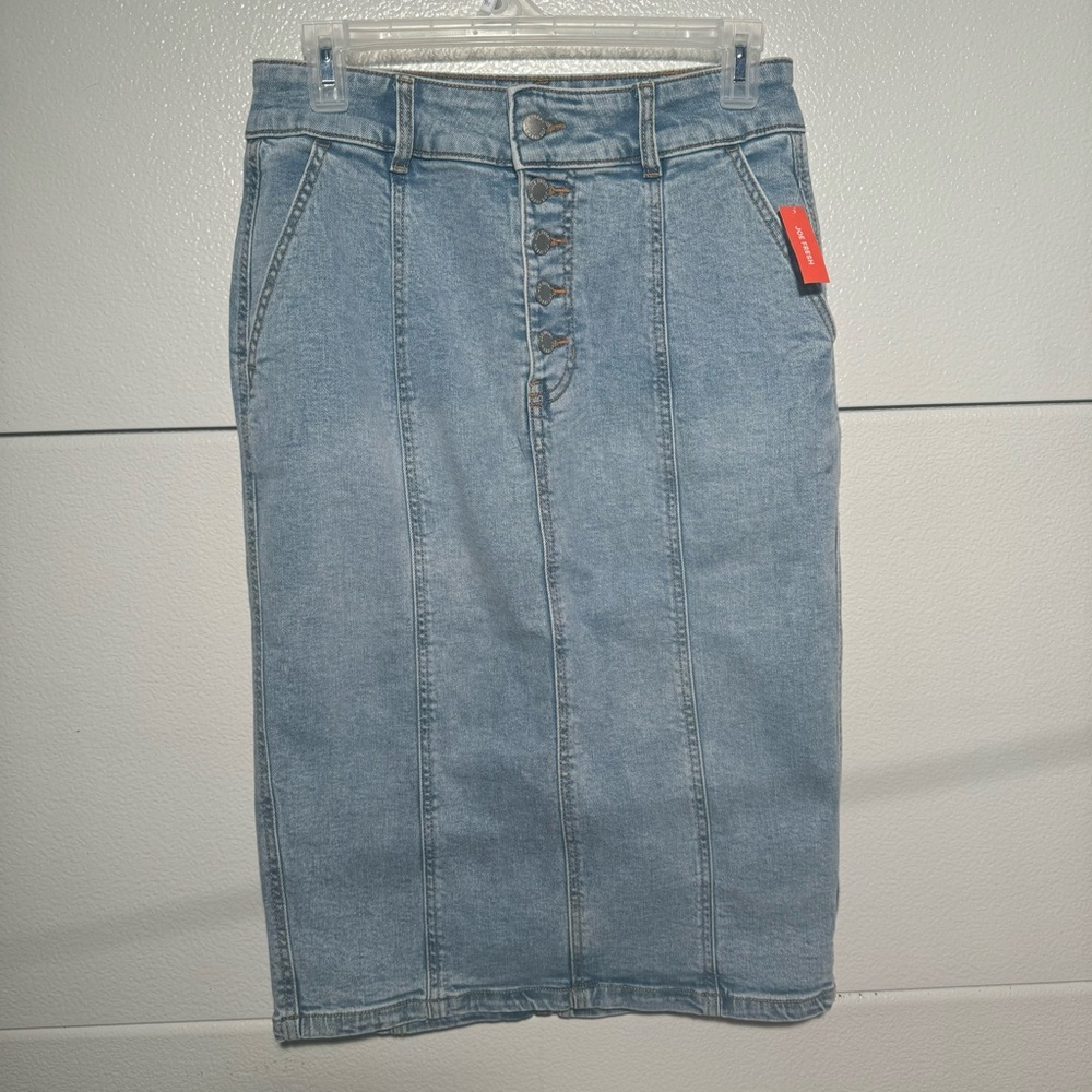 NWT. Joe Fresh Denim Skirt. Size 6. Button closure, knee length.
